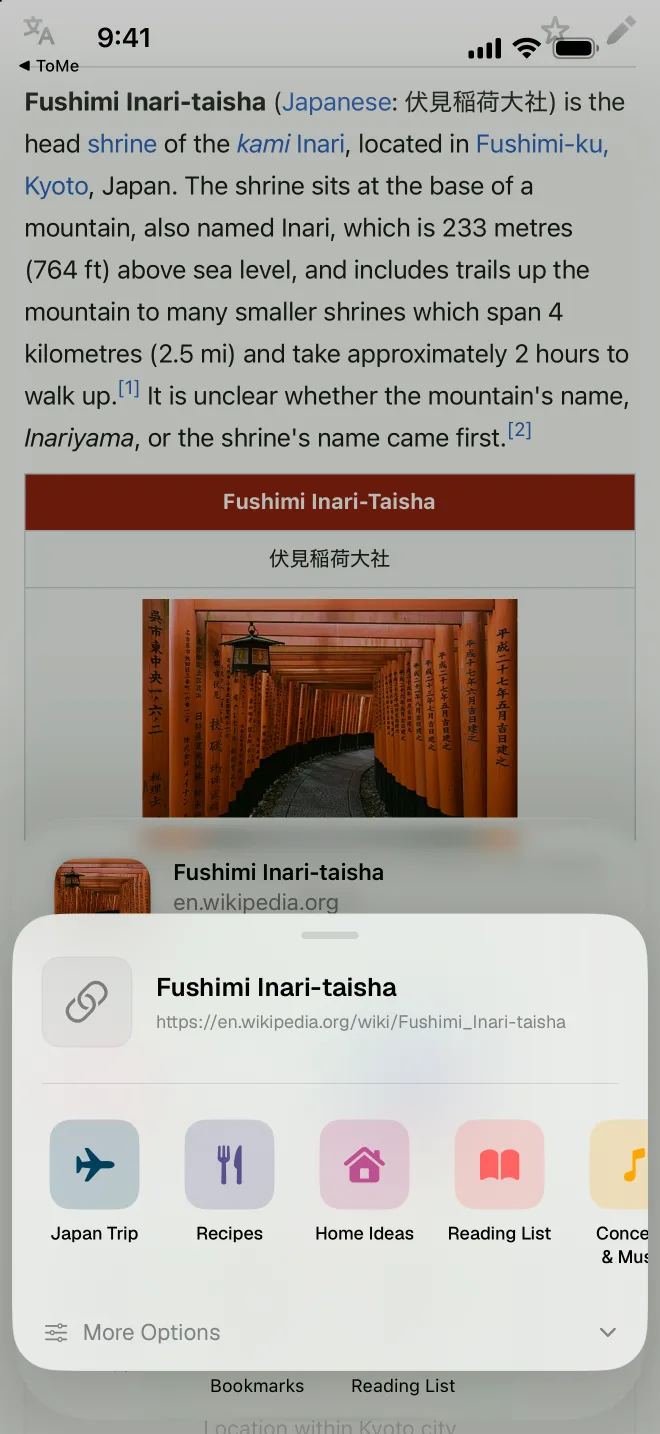 The iOS share sheet open over a Safari page, with ToMe showing a row of spaces to save into